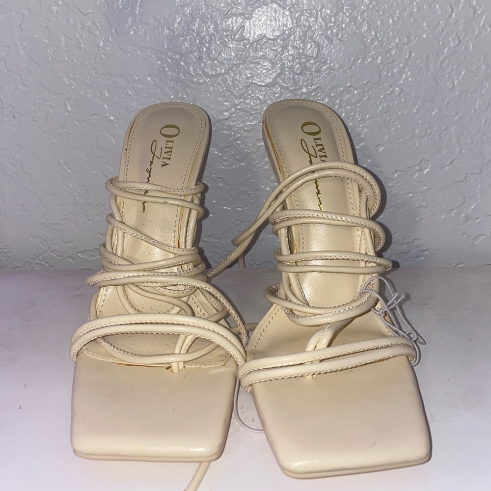Cream / white strappy heels